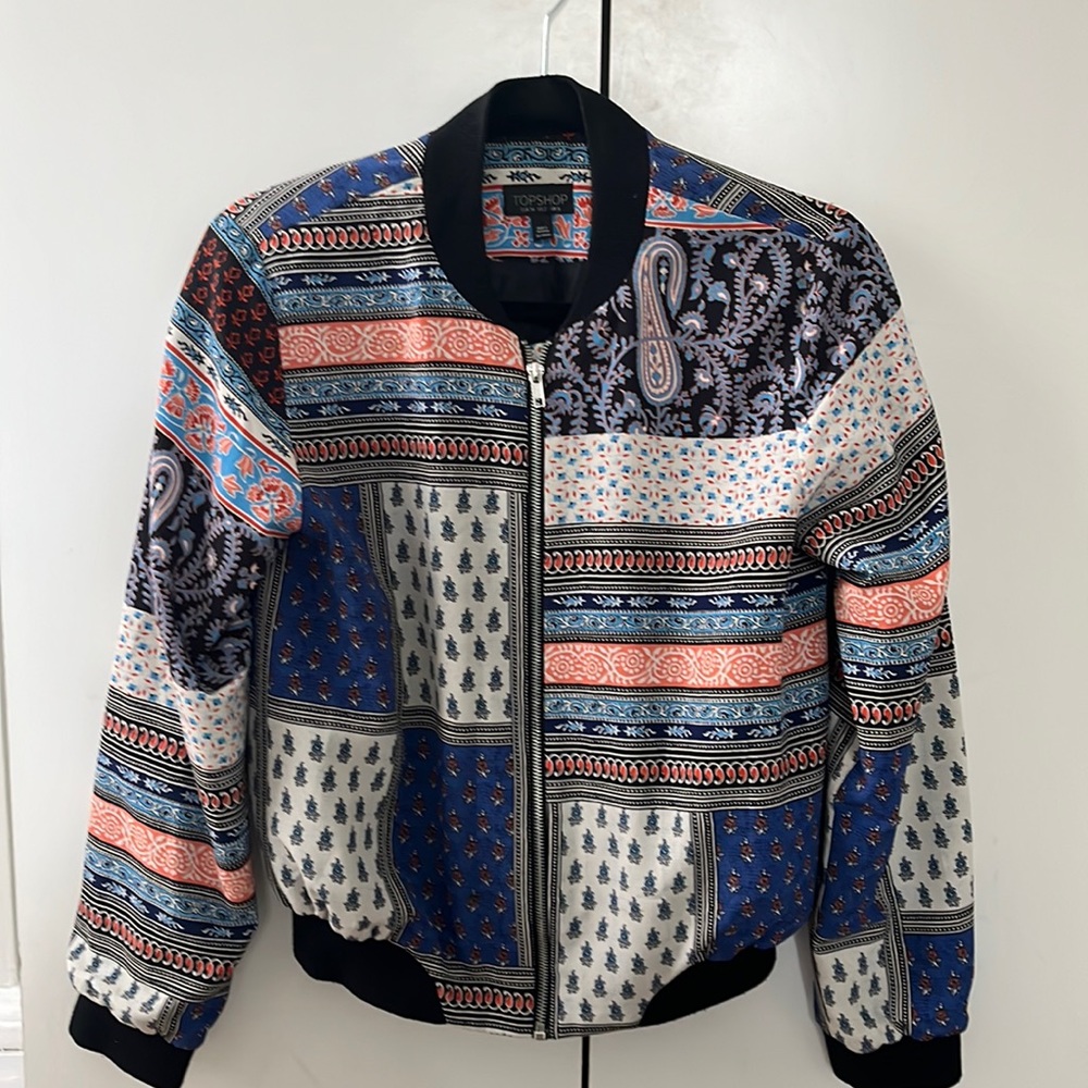 Top shop Bomber jacket. Printed blue and orange bomber. Size 2